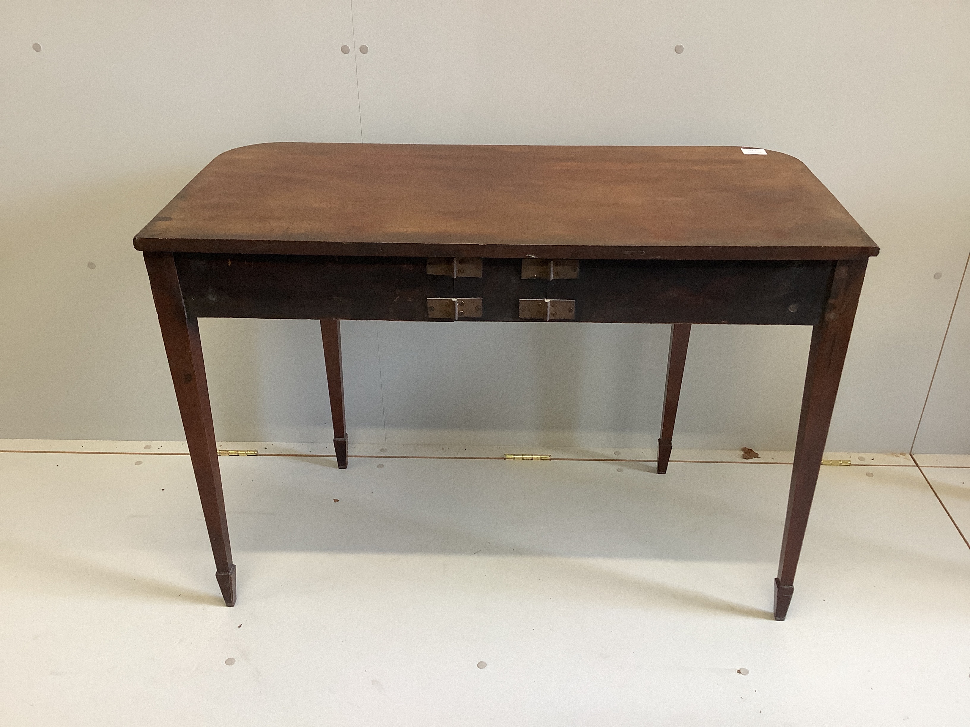 An early 19th century mahogany D shaped side table, with strung borders, width 103cm, depth 47cm, height 73cm